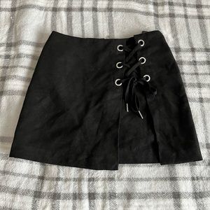 Lace up black mini skirt